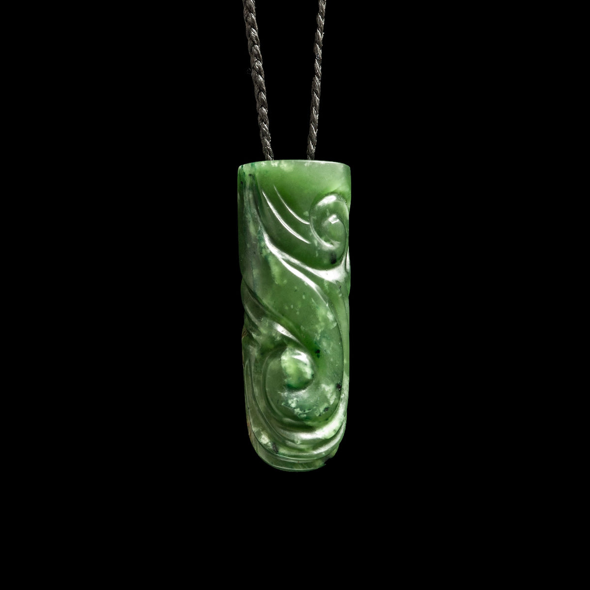 Carved koru pendant